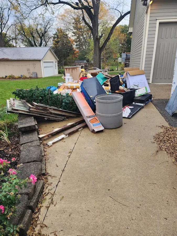 Dumpster being loaded with debris for Residential Dumpster Rental in Clearlake Riviera